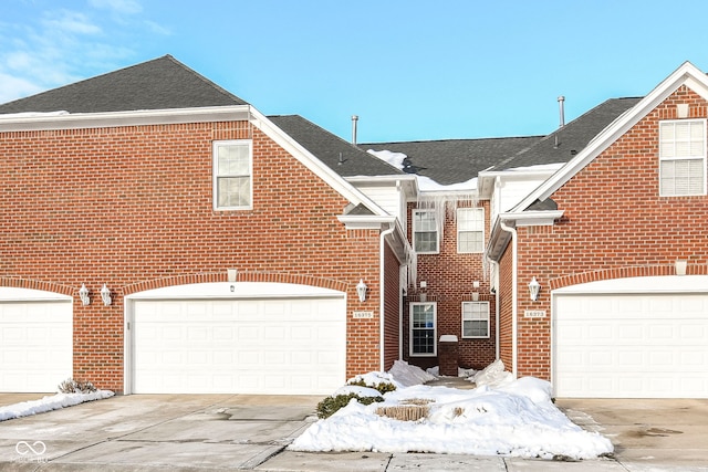 front facade with a garage