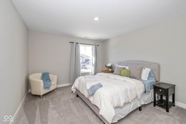 bedroom featuring light colored carpet