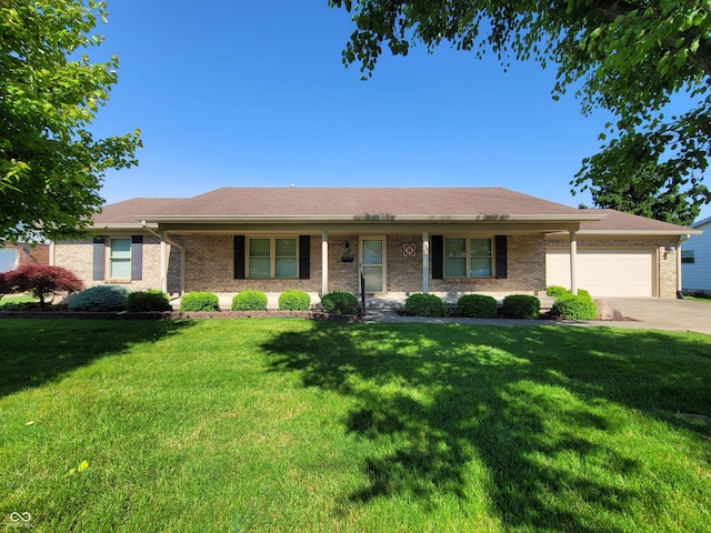 1220 N Arthur St, Rushville, IN 46173 - ranch-style house featuring a front lawn, a garage, driveway, brick siding, and a porch