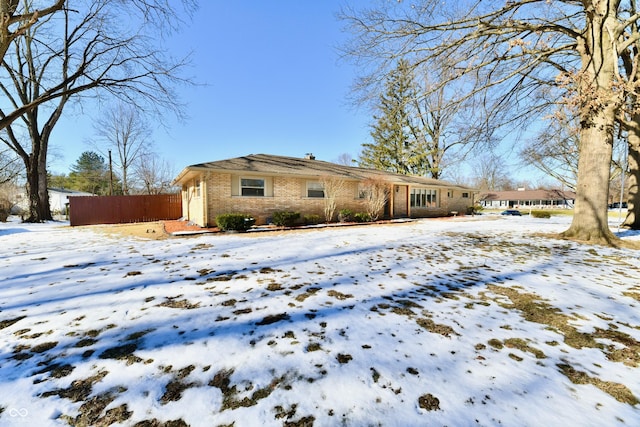 view of snow covered property