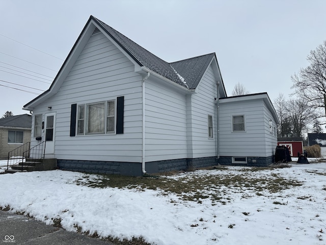 view of snow covered property