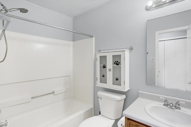 full bathroom with vanity, toilet, a textured ceiling, and shower / bathing tub combination