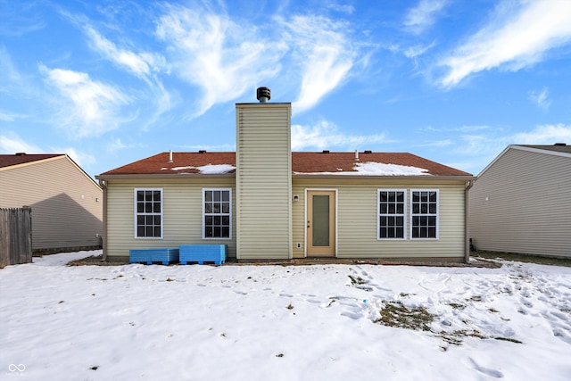 view of snow covered property