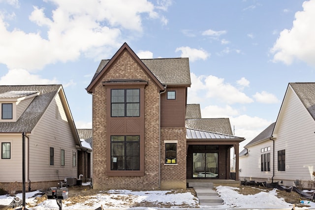 view of front of property featuring central AC unit