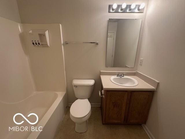 bathroom featuring toilet and vanity