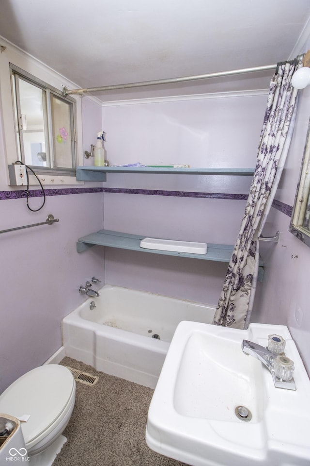 full bathroom with sink, toilet, and shower / bath combo