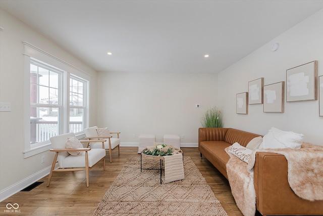 living area featuring hardwood / wood-style flooring