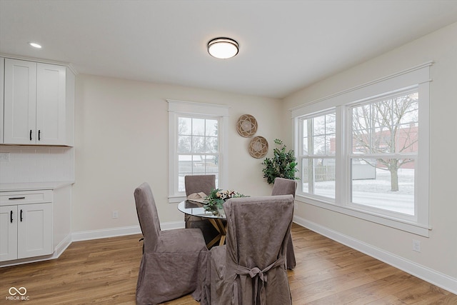 dining room featuring light hardwood / wood-style flooring