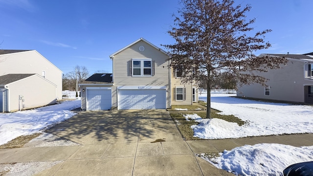 front of property with a garage