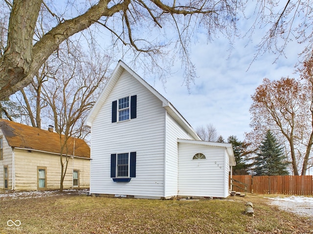 view of home's exterior featuring a lawn