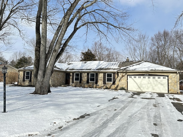 single story home featuring a garage