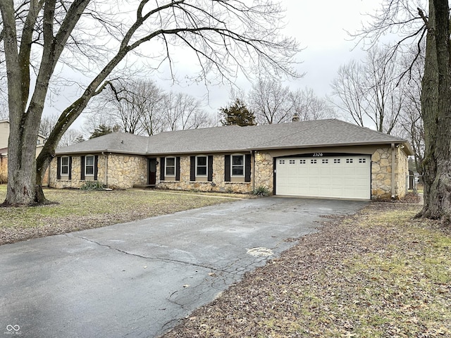 single story home featuring a garage