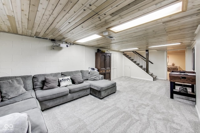 living room featuring light colored carpet and wooden ceiling