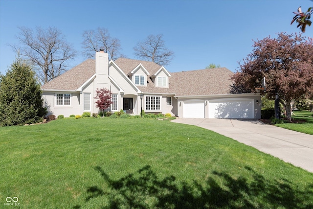 10295 Summerlin Way, Fishers, IN 46037 - cape cod house with a front lawn, concrete driveway, and an attached garage