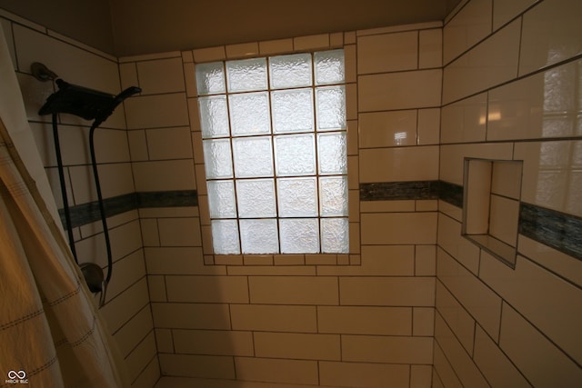 bathroom with curtained shower