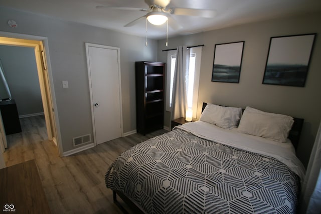 bedroom featuring ceiling fan and light wood-type flooring