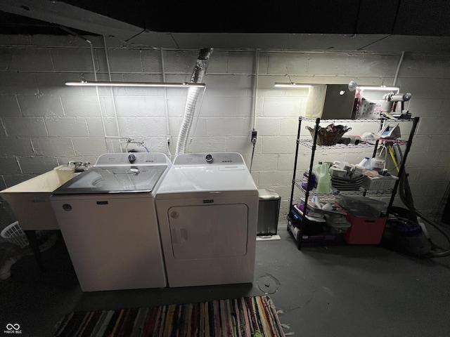 laundry area with separate washer and dryer