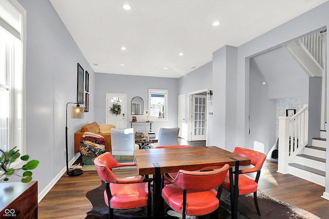 dining space featuring dark hardwood / wood-style flooring