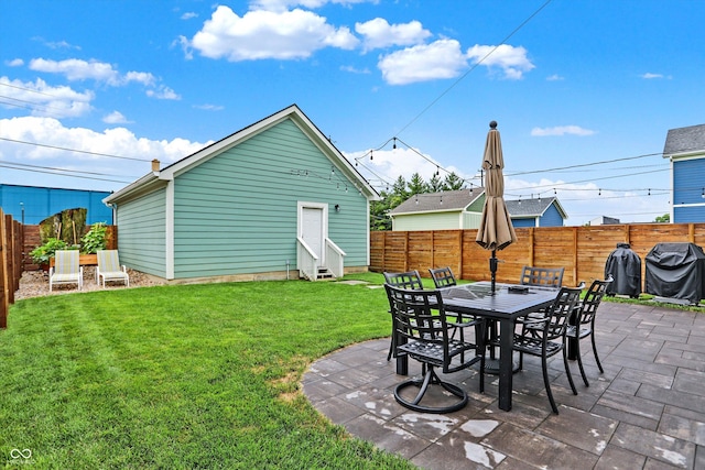 view of patio with a grill