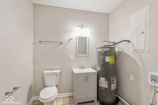 bathroom with vanity, toilet, electric panel, and electric water heater