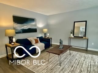 living room featuring wood-type flooring