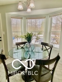 dining room featuring tile patterned flooring