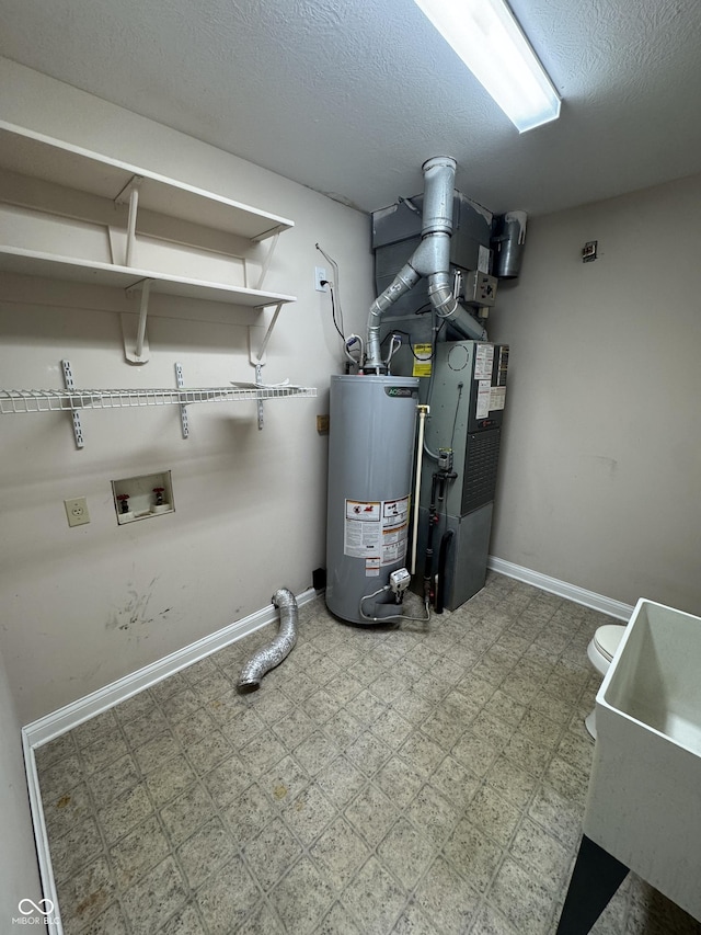 utility room featuring gas water heater