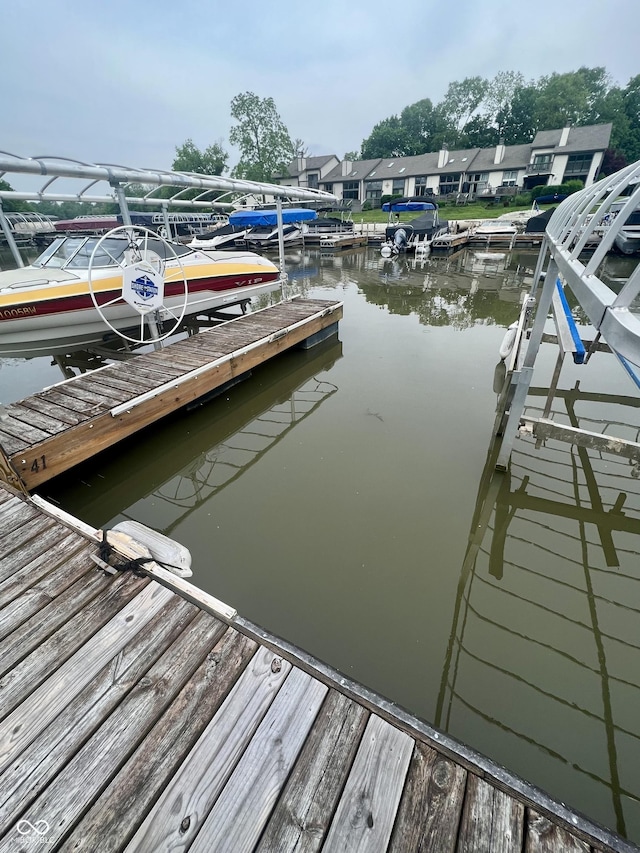 view of dock with a water view