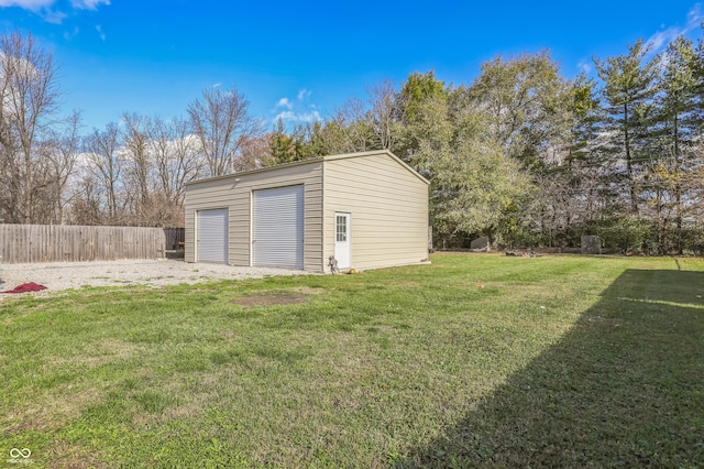 garage with a yard