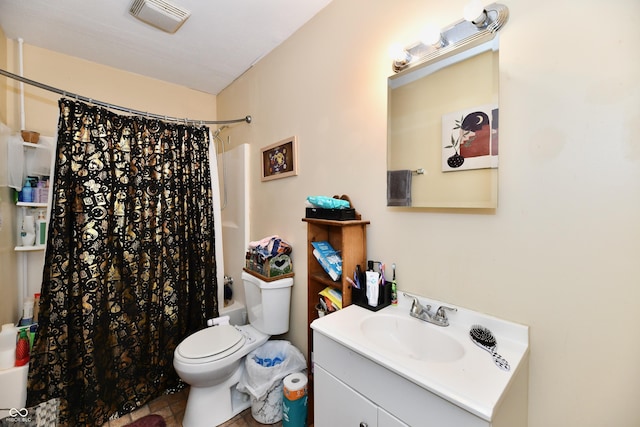 full bathroom with shower / tub combo, vanity, tile patterned flooring, and toilet