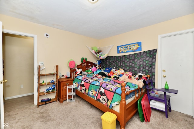 bedroom with light carpet