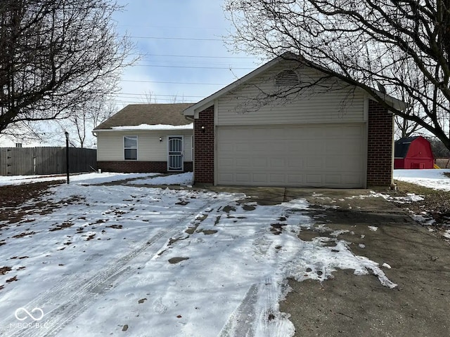 single story home with a garage