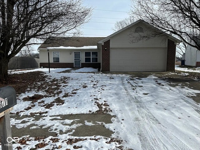 single story home featuring a garage