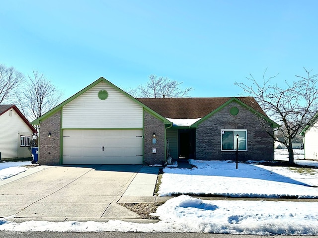 ranch-style house featuring a garage