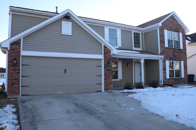 view of front of property featuring a garage