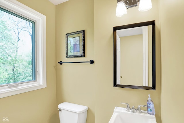 8602 Frontgate Ln, Indianapolis, IN 46256 - bathroom with a sink, healthy amount of natural light, and toilet