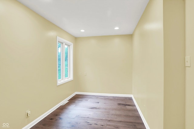8602 Frontgate Ln, Indianapolis, IN 46256 - unfurnished room with dark wood-type flooring, baseboards, and recessed lighting