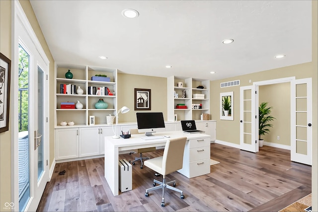 8602 Frontgate Ln, Indianapolis, IN 46256 - home office with light wood finished floors, recessed lighting, baseboards, and french doors