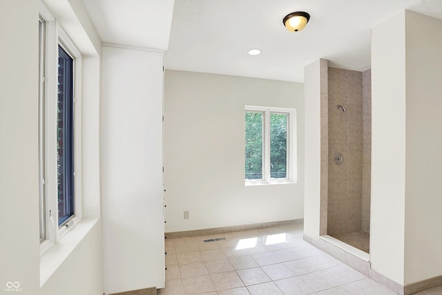 8602 Frontgate Ln, Indianapolis, IN 46256 - unfurnished room with light tile patterned flooring, baseboards, and recessed lighting