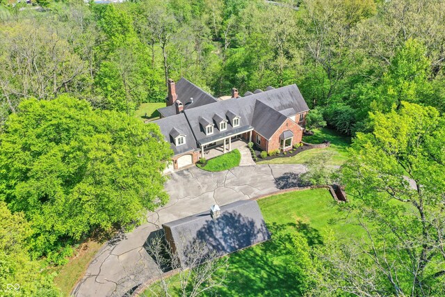 8602 Frontgate Ln, Indianapolis, IN 46256 - view from above of property with a forest