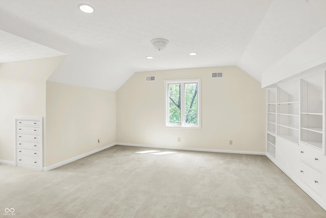8602 Frontgate Ln, Indianapolis, IN 46256 - bonus room featuring lofted ceiling, light carpet, baseboards, and recessed lighting