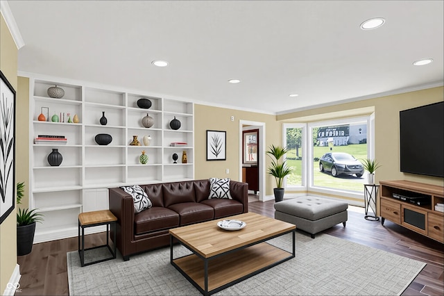 8602 Frontgate Ln, Indianapolis, IN 46256 - living room featuring crown molding, wood finished floors, recessed lighting, baseboards, and built in shelves