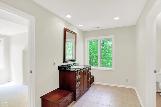8602 Frontgate Ln, Indianapolis, IN 46256 - bathroom featuring vanity, baseboards, recessed lighting, tile patterned floors, and toilet