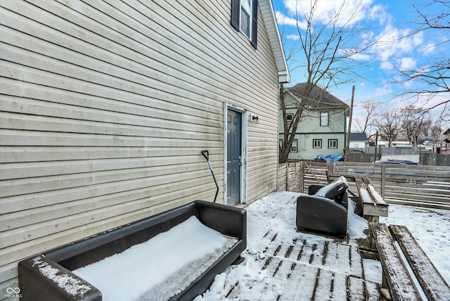 view of snow covered property