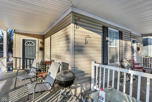 wooden deck featuring grilling area