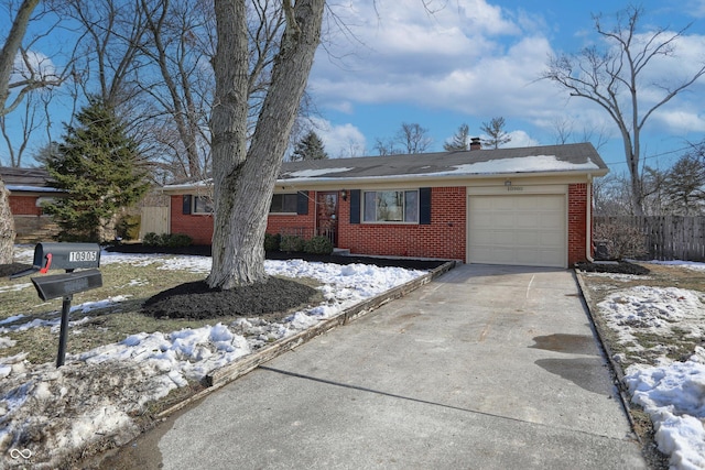 single story home featuring a garage