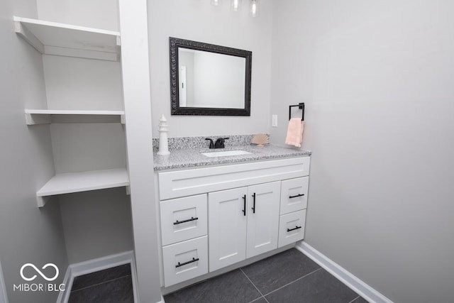 bathroom featuring tile patterned floors and vanity