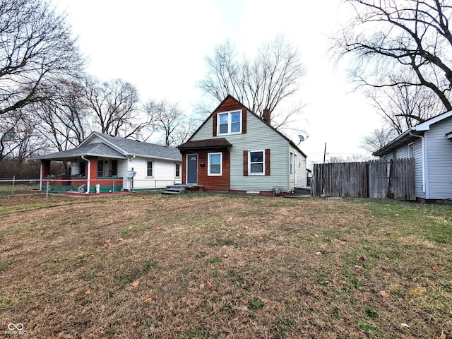 view of front of home with a front lawn