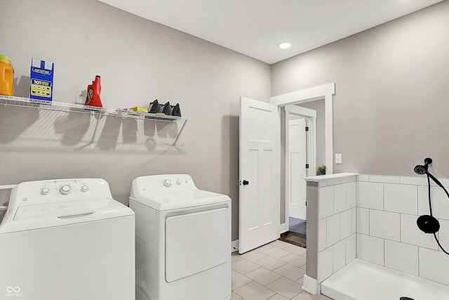 laundry room featuring light tile patterned flooring and independent washer and dryer