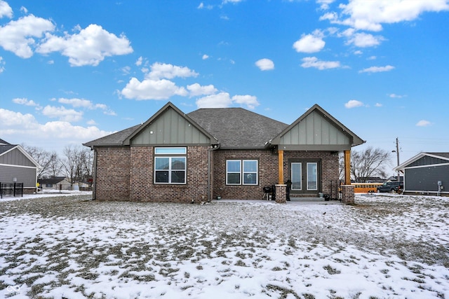 view of snow covered property